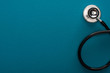 © LIGHTFIELD STUDIOS - top view of stethoscope on blue background
