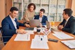 © Krakenimages.com - Business lawyers workers meeting at law firm office. Professional executive partners working on finance strategry at the workplace
