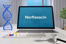 Norfloxacin – Medicine/health. Computer in the office with term on the screen. Science/healthcare