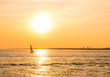 Sailing boat in the sunset of the Gulf of Finland