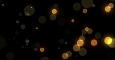 Leinwandbilder - Light bokeh gold background, abstract golden shine with blur. Yellow light bokeh glitter flares effect, glittery particles and bright, glowing shiny sparkles on black background, Christmas design