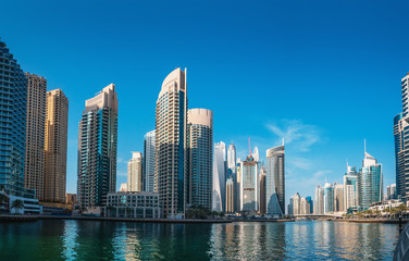 Wall Mural - Luxury Dubai Marina canal in Dubai with high buildings at background, United Arab Emirates.