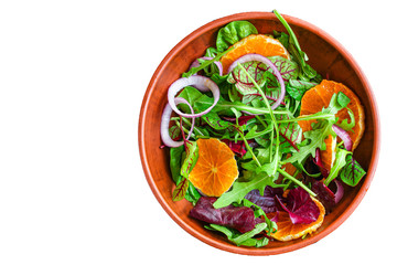 healthy salad tangerines citrus, lettuce, arugula and other herbs. Menu concept food background, keto or paleo diet. top view. copy space for text