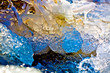 frozen stream with abstract ice forms