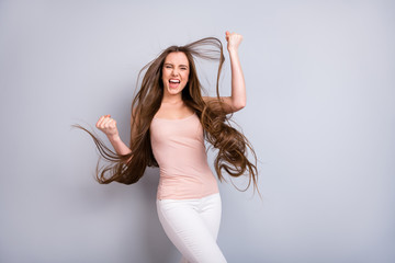 Portrait of her she nice attractive lovely well-groomed cheerful cheery satisfied successful brown-haired girl rejoicing having fun isolated on light gray pastel color background