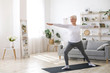 © Prostock-studio - Sport On Retirement. Active Senior Woman Doing Pilates Workout At Home
