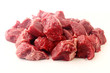 © AGPhotography - pile of diced chopped raw beef cube isolated on white background