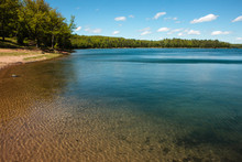 The Shoreline Of Clear Lake, At Clear Lake State Park In Oneida County, Wisconsin On A Beautiful Early June Afternoon.