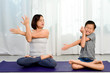 © TinPong - Mom teach yoga to her son