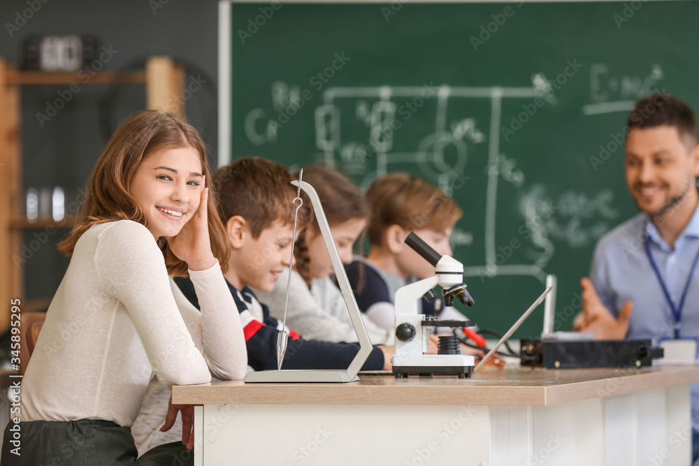 Pupils at physics lesson in classroom