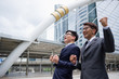 © JuYochi - Two Businessman Success is showing symptoms of happiness.