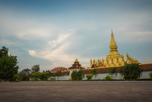 Thatluang Is The Most Beautiful Culture And Icon Of Vientiane Laos. Thatluang At Sunset