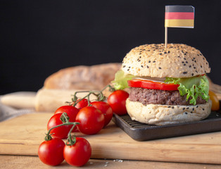 Hamburger homemade on wood table.