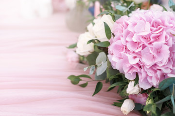 Wall Mural - Original wedding floristics closeup. The wedding flower bouquet is supplemented with rose hortensia, roses and greenery. Floral background copy space