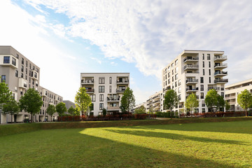 Wall Mural - Cityscape of a modern residential area with apartment buildings, new green urban landscape in the city