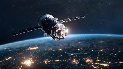 Leinwandbilder - Space ship on orbit of Earth planet. Expedition of cargo spacecraft to ISS. Deep space and cities lights. Elements of this image furnished by NASA.