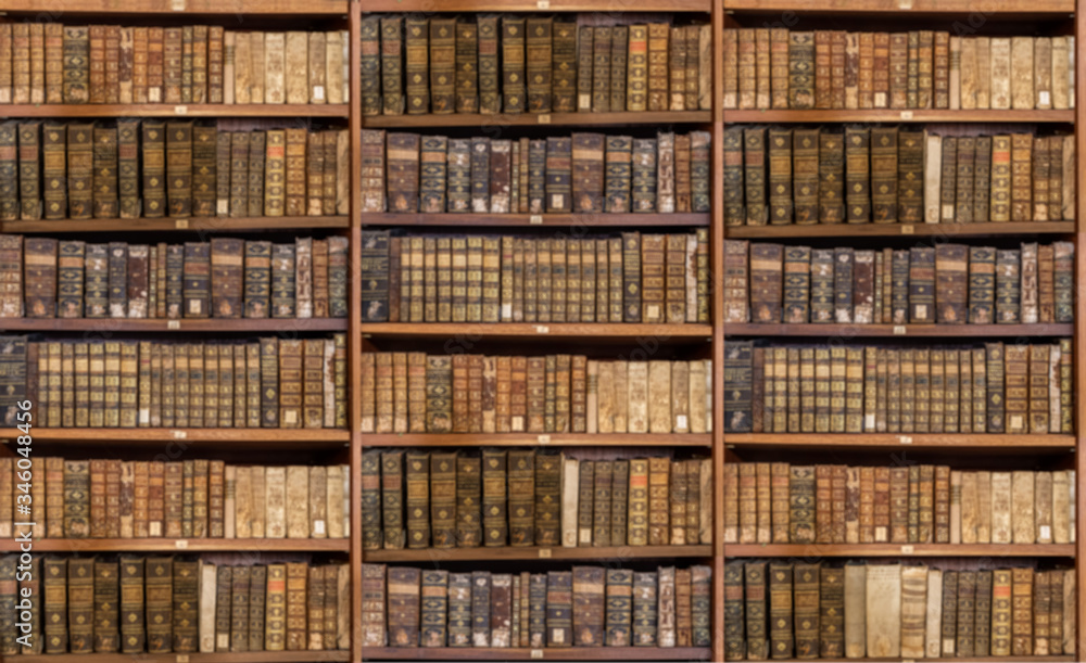 Defocused And Blurred Image Of Old Antique Library Books On Shelves For Use In Video Conferencing Background Stock Gamesageddon
