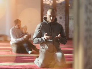 Wall Mural - muslim people praying in mosque