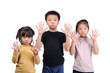 © sweetlemontea - Children health care for germs and touch concepts. Three little Asian boy and girls shocking by bacteria on hands. 3 Kids doing gestures and expressing very shocked and raise hands to hold near face.