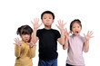 © sweetlemontea - Children health care for germs and touch concepts. Three little Asian boy and girls shocking by bacteria on hands. 3 Kids doing gestures and expressing very shocked and raise hands to hold near face.