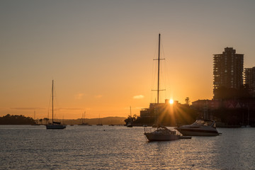 Wall Mural - yachts on the water at sunrise