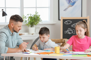 Drawing teacher giving private lessons at home