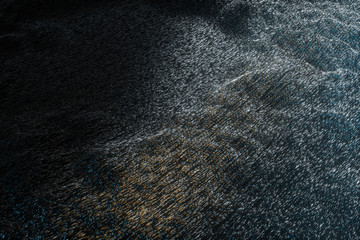 Dense background of metal particles, 3d rendering.