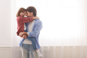 Wall Mural - Loving daddy and daughter posing at home