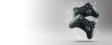The Concept Of Video Games. Two Gamepads Levitate On A Light Background. Wide Banner.