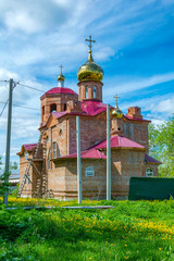 Wall Mural - The construction of the Orthodox Church of Archangel Michael in the village Ismore