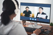 © natara - Woman video conference with team on computer