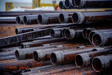 Wall Mural - Construction of Oil and Gas Pipeline, horizontal directional drilling. Drilling of oil and gas wells. In the foreground, a threaded joint of pipes