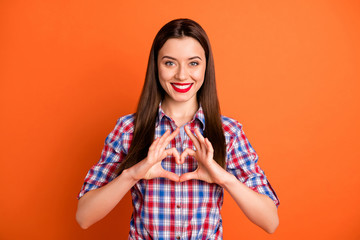Wall Mural - Portrait of positive cheerful girl enjoy 14-february date show love sign heart finger to her boyfriend wear good look clothes isolated over vivid color background