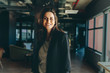 © Jacob Lund - Smiling female executive in her office