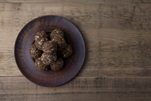 Oat And Nut Home Made Energy Balls In A Brown Plate