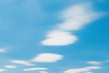 Canvas Print - White clouds in a blue sky