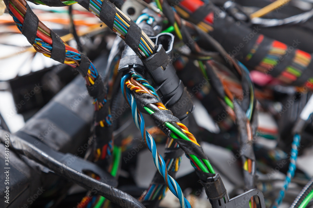 Twisted wires of different colors size and type rewound with black ...