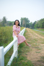Asian Woman Take Picture On Field Show Travel Nature Concept