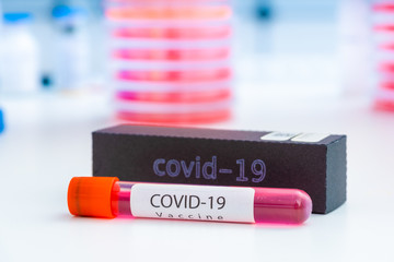 Sticker - Coronavirus Covid-19 vaccine vial in medical lab, immunization and treatment from coronavirus (Covid-19) medical equipment concept