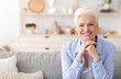 © Prostock-studio - Safe Retirement Concept. Portrait Of Cheerful Senior Woman Posing At Home