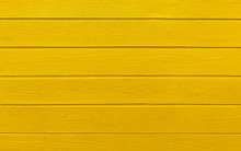 Wooden Boards Painted In Yellow. Yellow Wood Background.