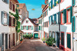 Cosy colorful street of historic old town in Basel, Switzerland