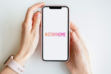 Call to stay at home during quarantine.Mobile phone in hands with # stay home
Quarantine and warning, outbreak alert on mobile phone.Stay home to stop the spread of COVID-19 coronavirus.Global Covid-1