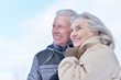 © aletia2011 - Portrait of happy senior couple at winter outdoors