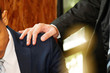 Businessmen encourage : Businessman smashing shoulders encouraging colleagues : Close up of male business man comforting colleagues with worries.
