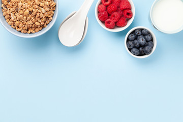 Wall Mural - Healthy breakfast with granola and berries