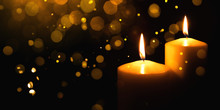 Burning Candles With Festive Bokeh On A Black Background. Holiday Concept.