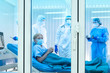 © godji10 - Elderly Covid-19 patient lying in quarantine room waiting to diagnosed by medical team. Poor women are suffering from lung infection in restricted area. Part of coronavirus 2019-2020 global pandemic