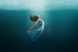 Dancer underwater in a state of peaceful levitation