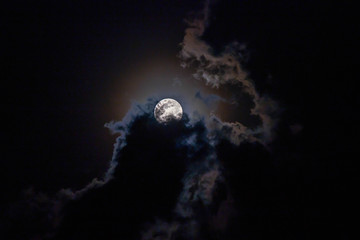 Wall Mural - The moon is blocking the clouds.